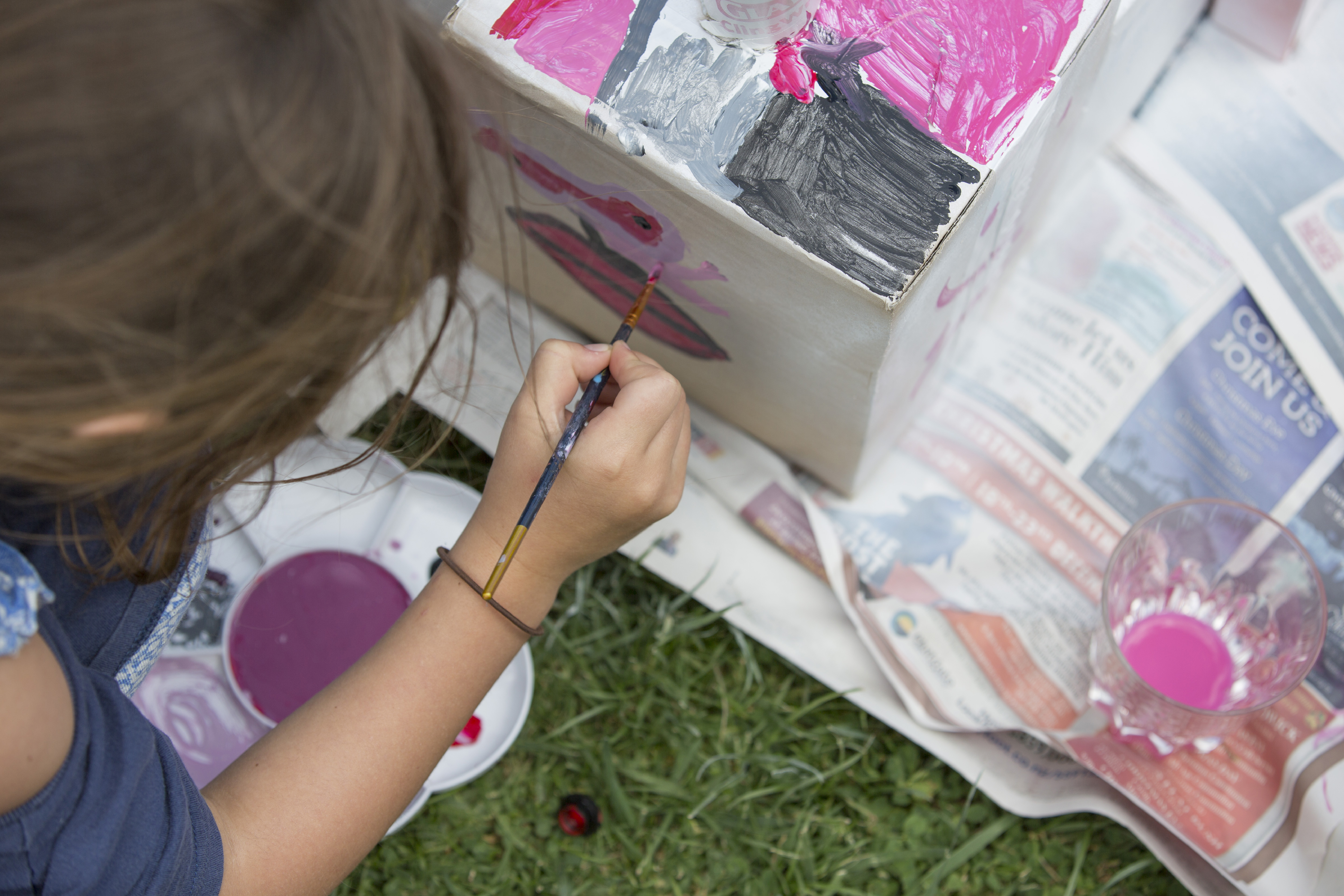 child painting with baking soda watercolor paint