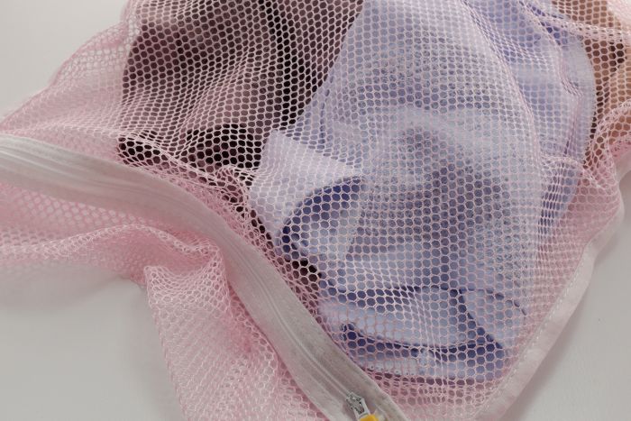 Mesh laundry bag for socks and intimates .